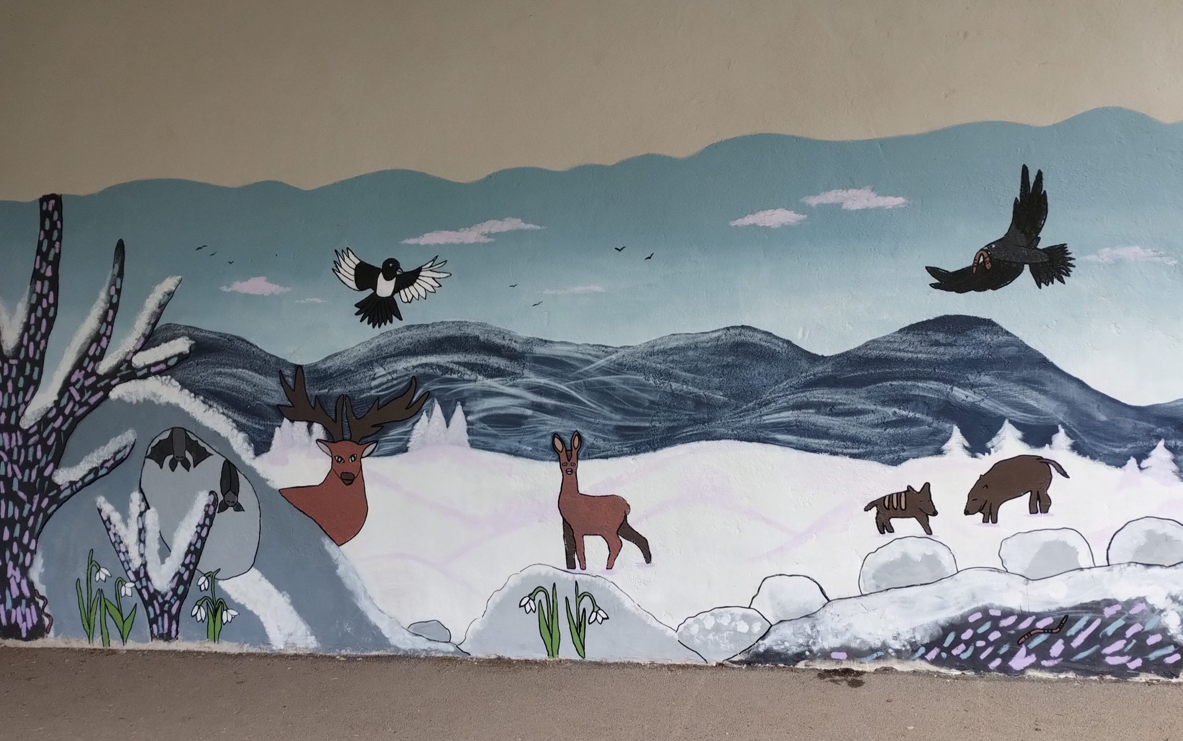 hiver sur la fresque de l'école faite par les enfants de Moulet-Marcenat, Volvic